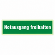 Rettungsschild "Notausgang freihalten" – Kunststoff langnachleuchtend selbstklebend