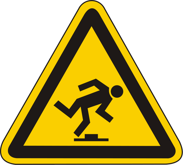 Warnschild Warnung vor Stolpergefahr
